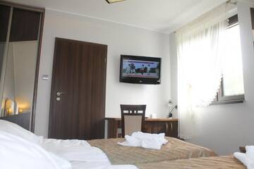 Фото номера Стандартный двухместный номер с 2 отдельными кроватями Отель Hotel Cykada г. Вельки Глембожек 8